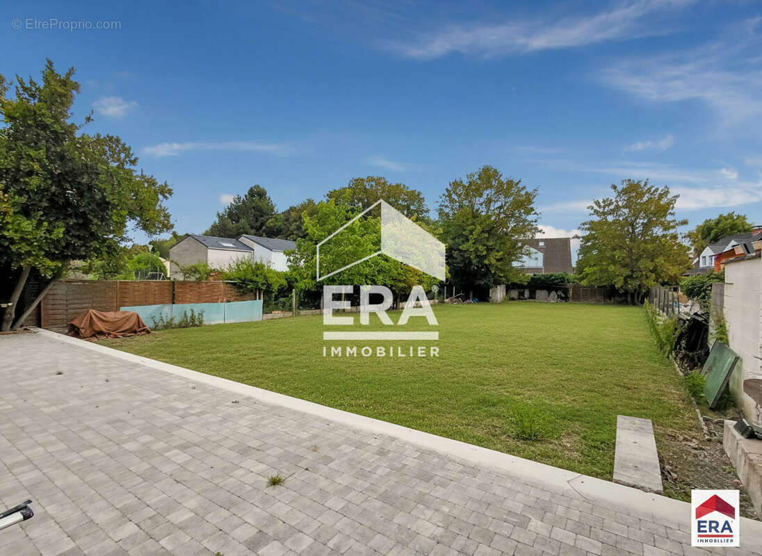 Maison semi plein pied - 175 m² - Jardin - Garage double - Lys-Lez-Lannoy - photo 2