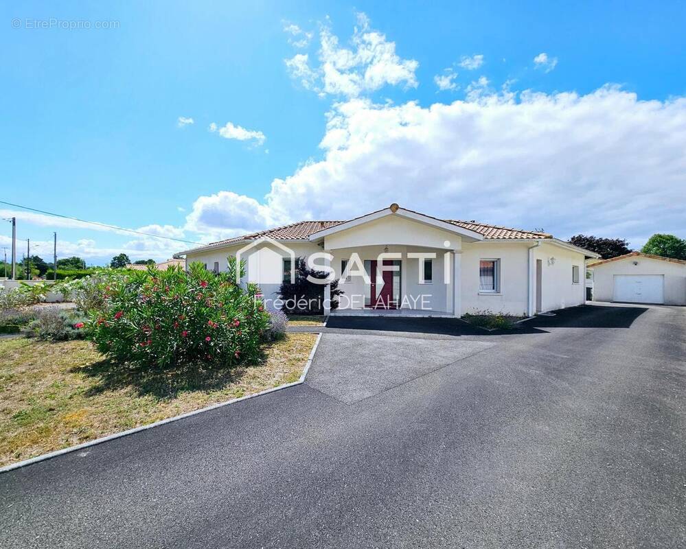 Photo 1 - Maison à PAREMPUYRE