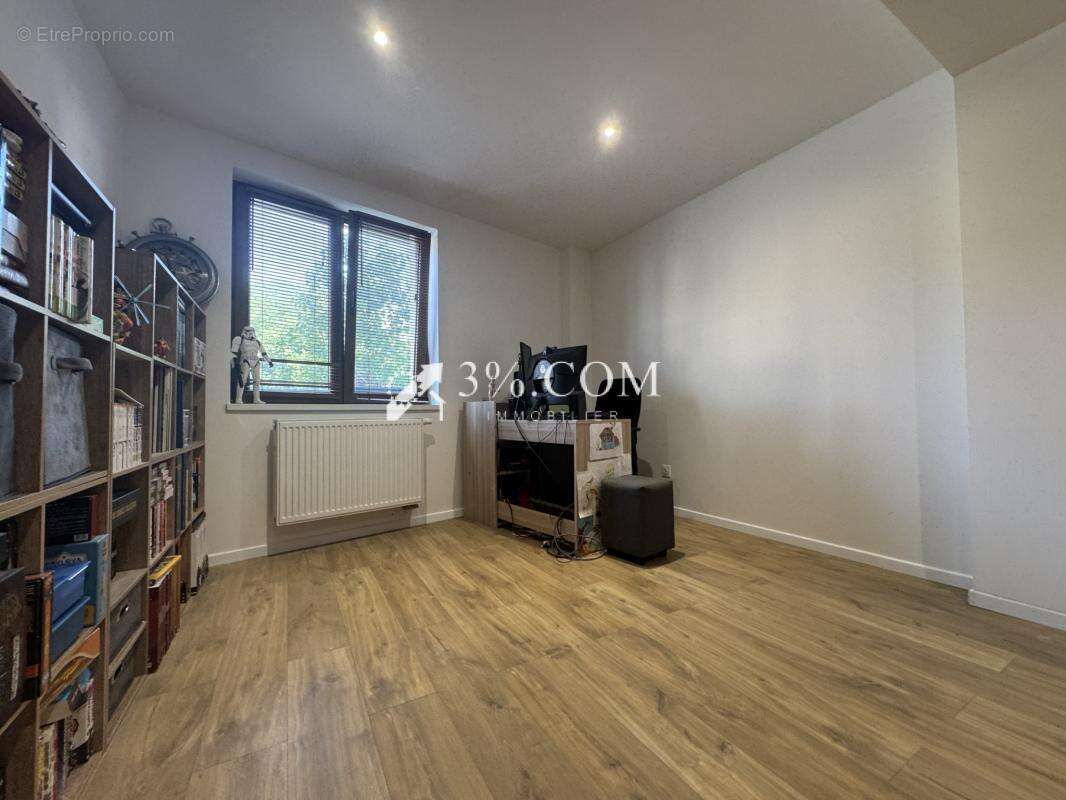 3%COM Beau F3 rénové au centre de MOMMENHEIM - photo 9