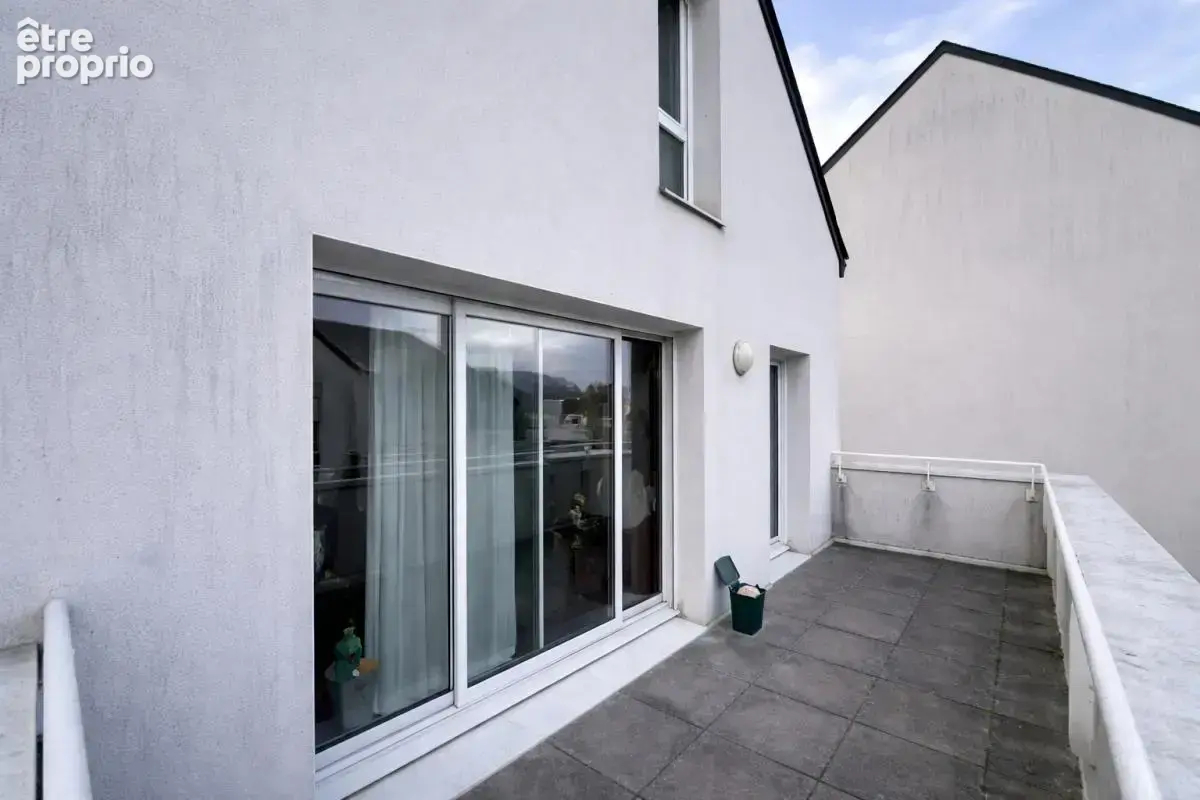 SURZUR Appartement T3 en DUPLEX de 67,70 m2, lumineux. À pied du bourg - photo 10