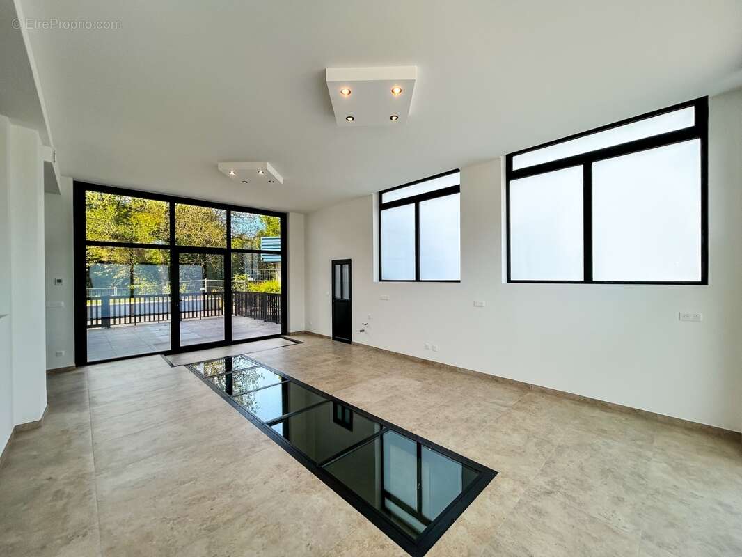 À vendre – Magnifique appartement T4 traversant de 196,16 m² au sol à Viuz-en-Sallaz - photo 4