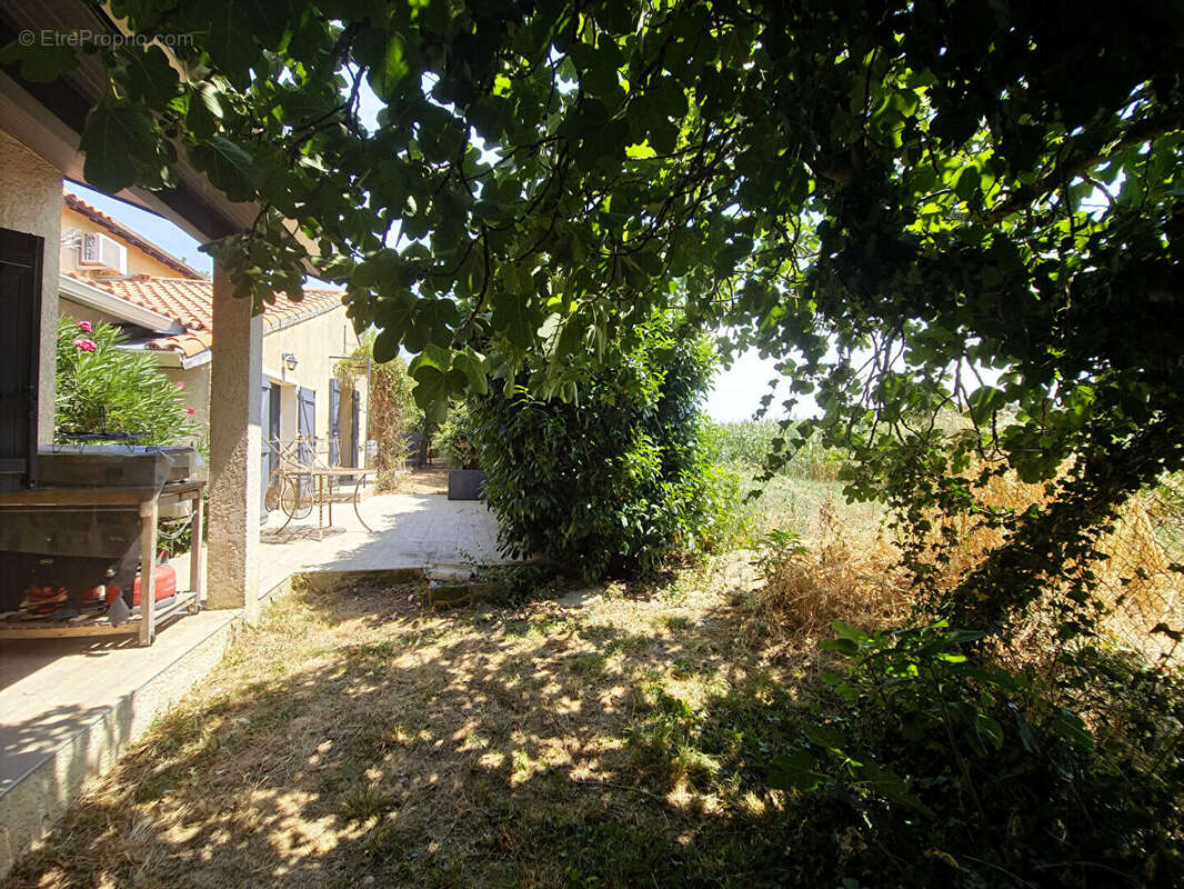 Maison familiale avec 3 chambres et jardin intimiste, proche commerces à Lavernose-Lacasse - photo 12
