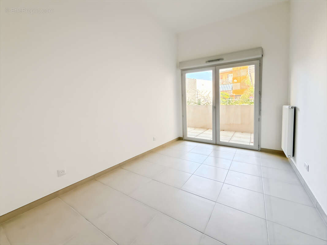 Appartement T3 avec terrasse et jardin plein sud - photo 7
