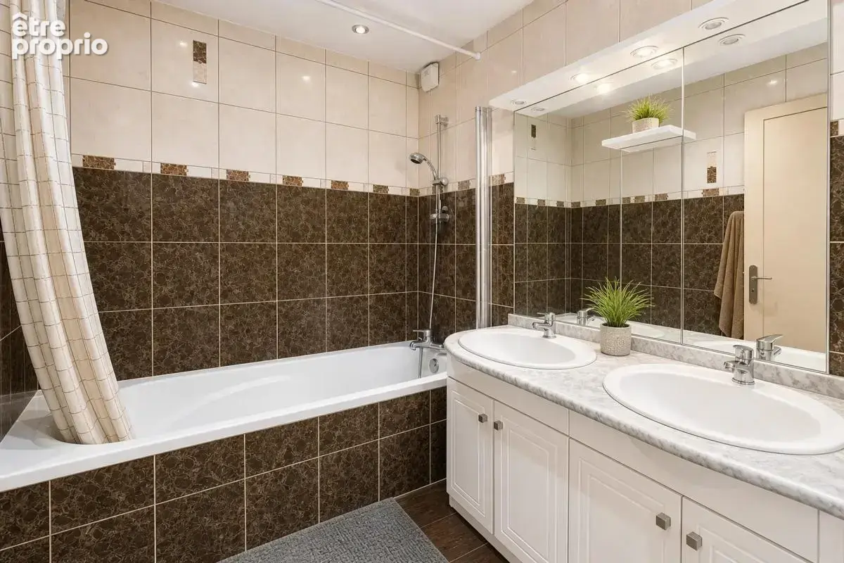 Appartement F4 de 76m2 en rez-de-chaussée dans résidence rénovée - photo 11