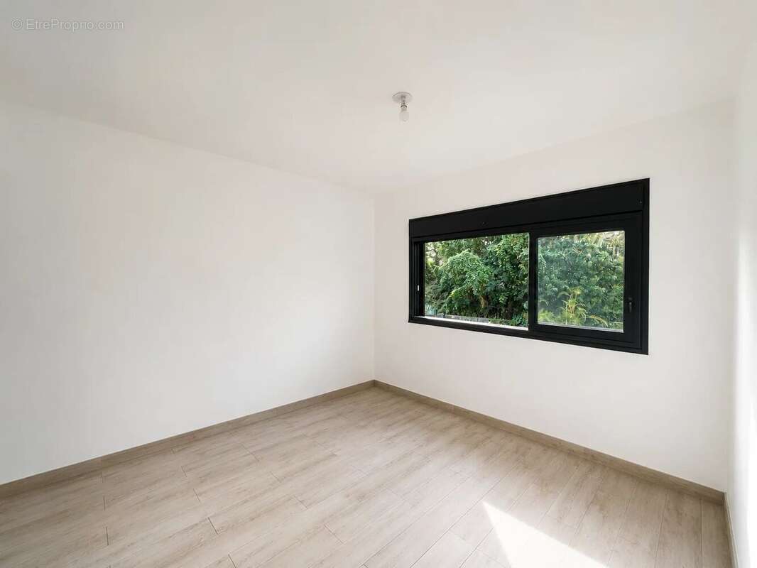 Maison 70 m² à Le Tampon  - photo 7