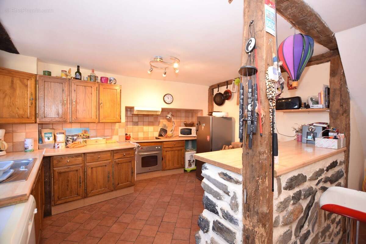 Maison 125 m² à Pleaux  - photo 7