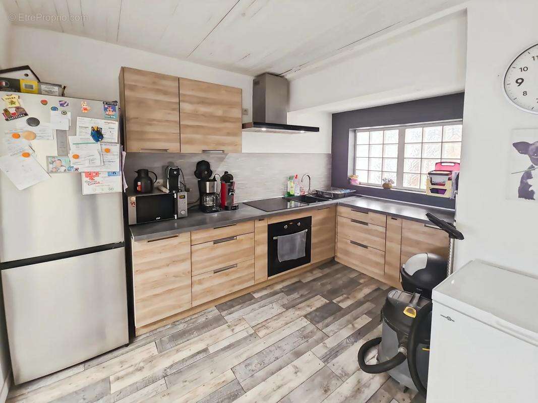 Maison à QUIEVRECHAIN