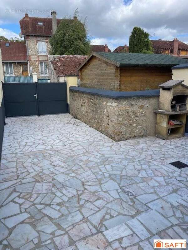 Photo 2 - Maison à LIEUSAINT