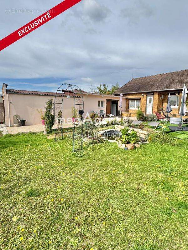 Maison à BOUZINCOURT