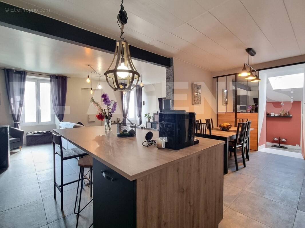 1000020538 - Maison à LIEUSAINT