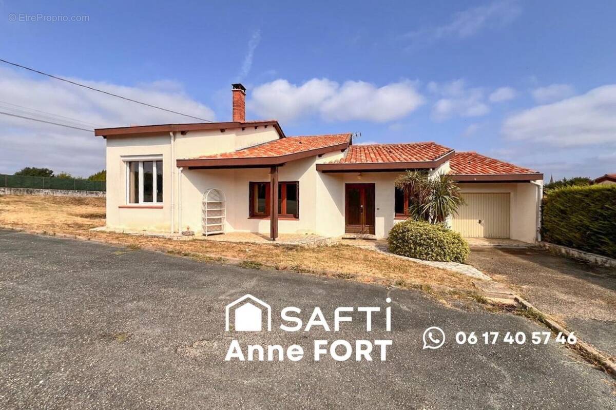 Photo 1 - Maison à LAROQUE-TIMBAUT