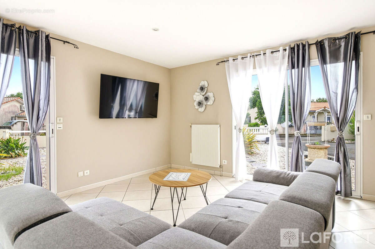 Maison familiale 4 chambres avec véranda, garage et extérieur paysager - Biscarrosse Bourg, secteur calme - photo 4