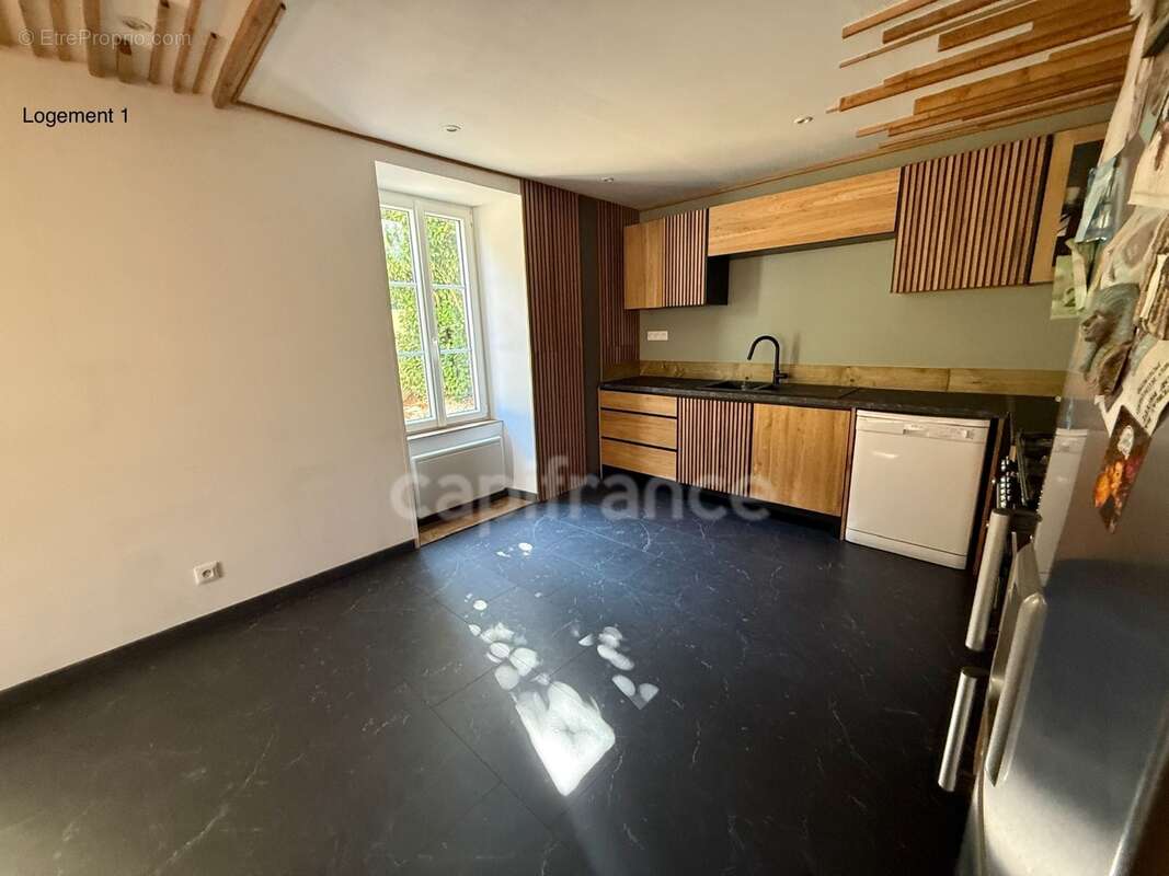 Maison avec deux logements indépendants : une opportunité rare pour habiter, investir ou réunir plusieurs générations - photo 23