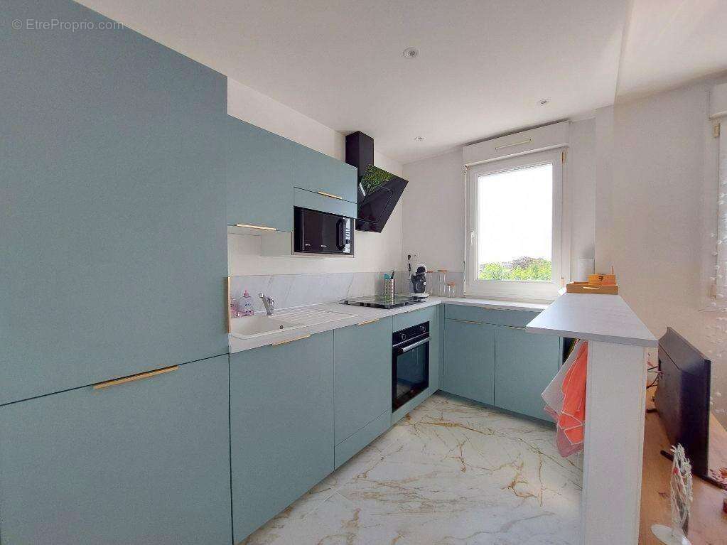 Appartement à DONVILLE-LES-BAINS