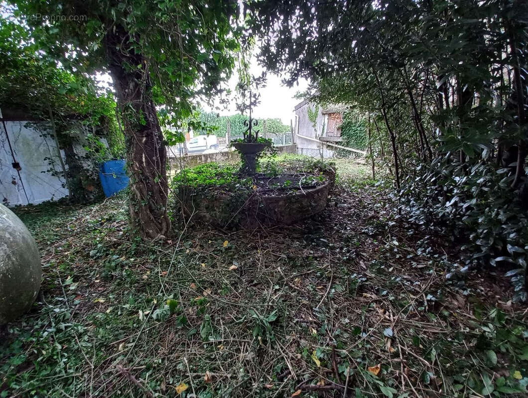 Maisonnette à réhabiliter en bordure de forêt avec jardin et garage - photo 5