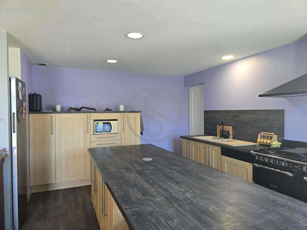 Maison de plain-pied de 126m2 - photo 5
