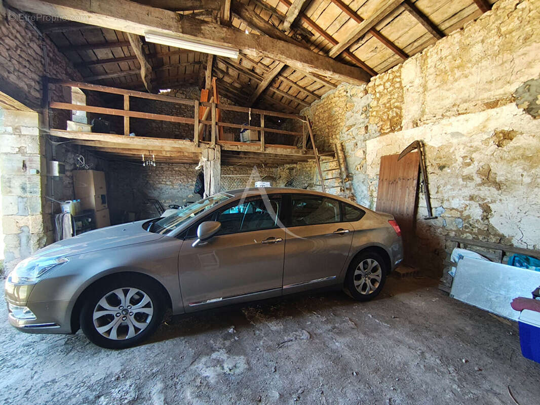 Maison à SOULIGNONNE