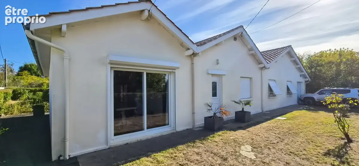 Le Taillan Médoc - Proche centre ville - maison de plain-pied de 120m² + garage sur parcelle de 1300m²  - Calme et arboré - photo 11