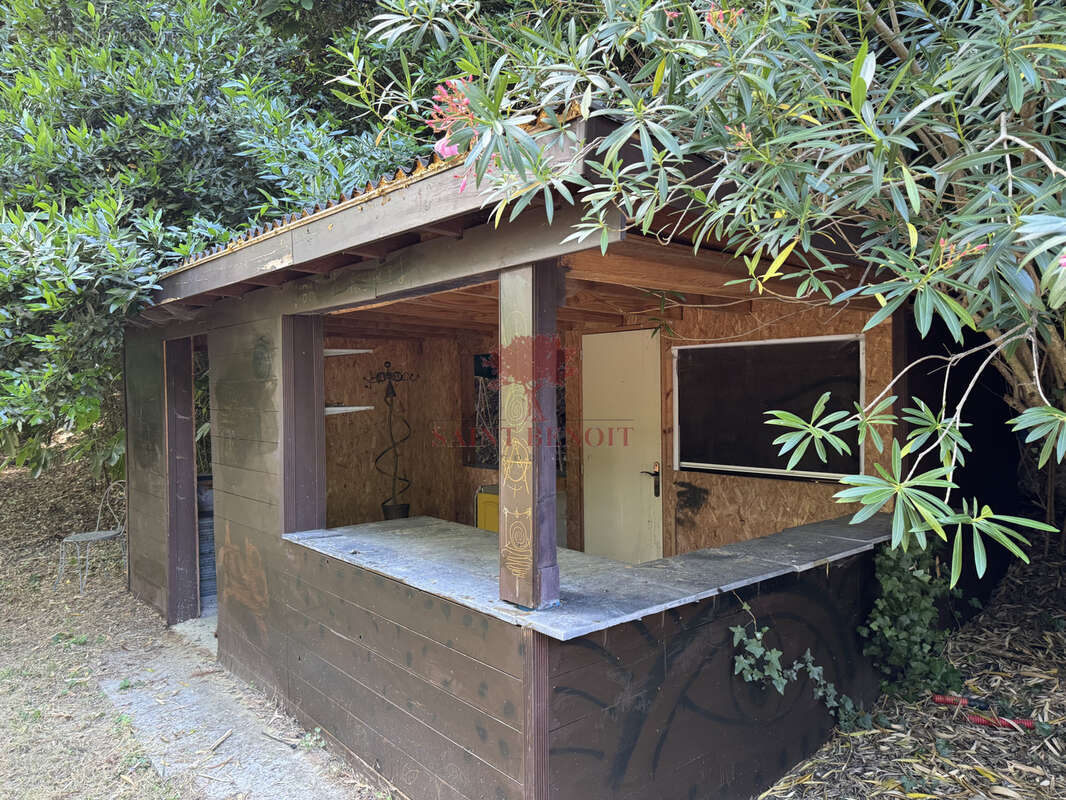 Maison de type t3 sur 2 niveaux et un appartement de type t2 sur une parcelle arboree de 6069m2 avec un bassin - photo 38