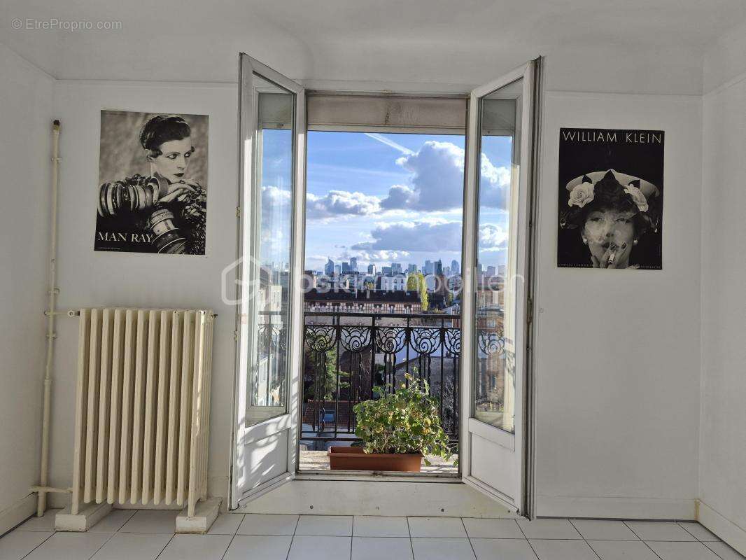 Dernier etage avec balcon et vue spectaculaire sur paris et la defense - photo 13