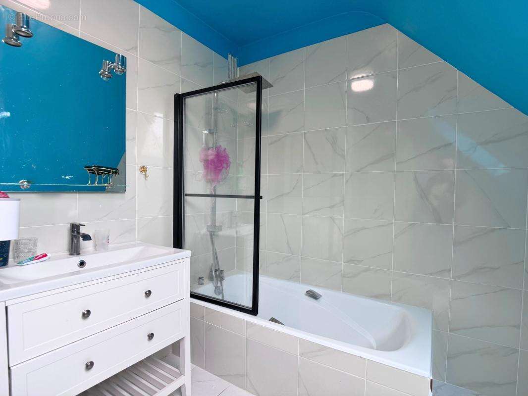 RENNES LA POTERIE – Maison familiale 136 m² avec jardin, véranda et garage - photo 12