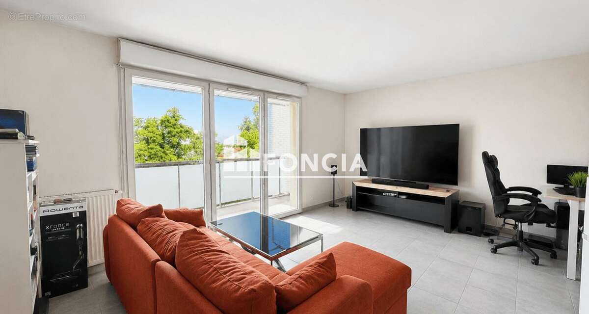 Appartement 3 pieces avec terrasse et parking sous sol - photo 2