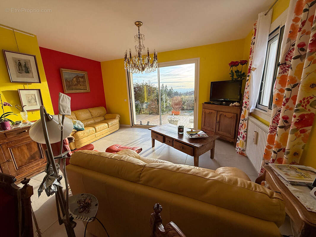 Maison à RENAISON