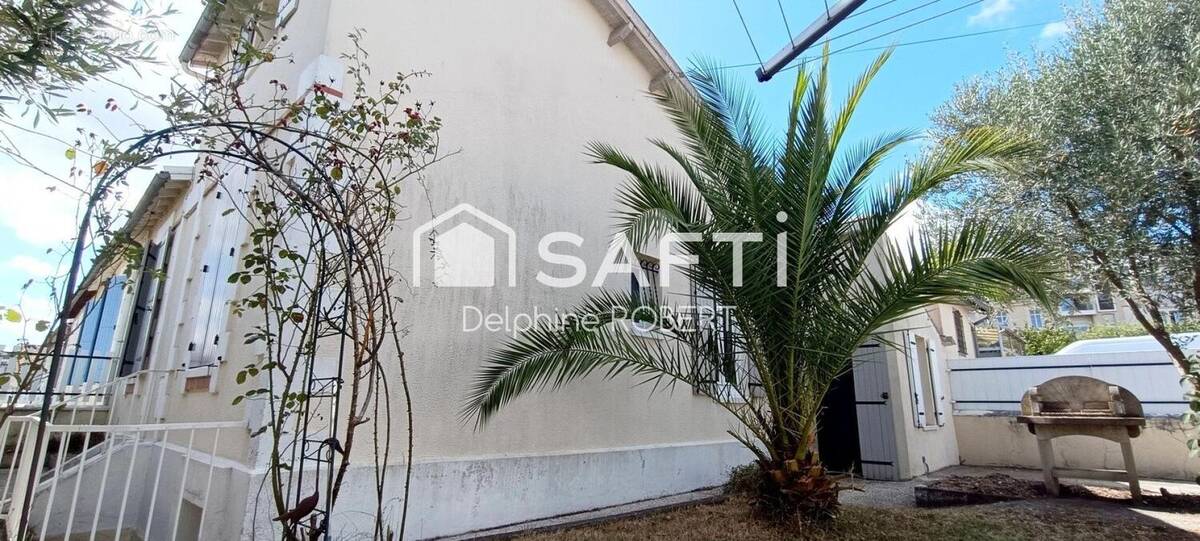 Photo 1 - Maison à SAINTES