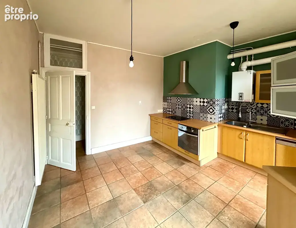 CLERMONT-FERRAND / Immeuble de caractère du XIXe, 84 M2 habitables et espaces chaleureux ! - photo 9