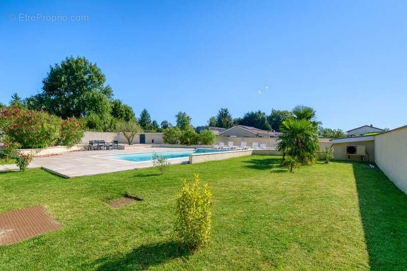 Maison à SAINT-JEAN-DE-THURIGNEUX