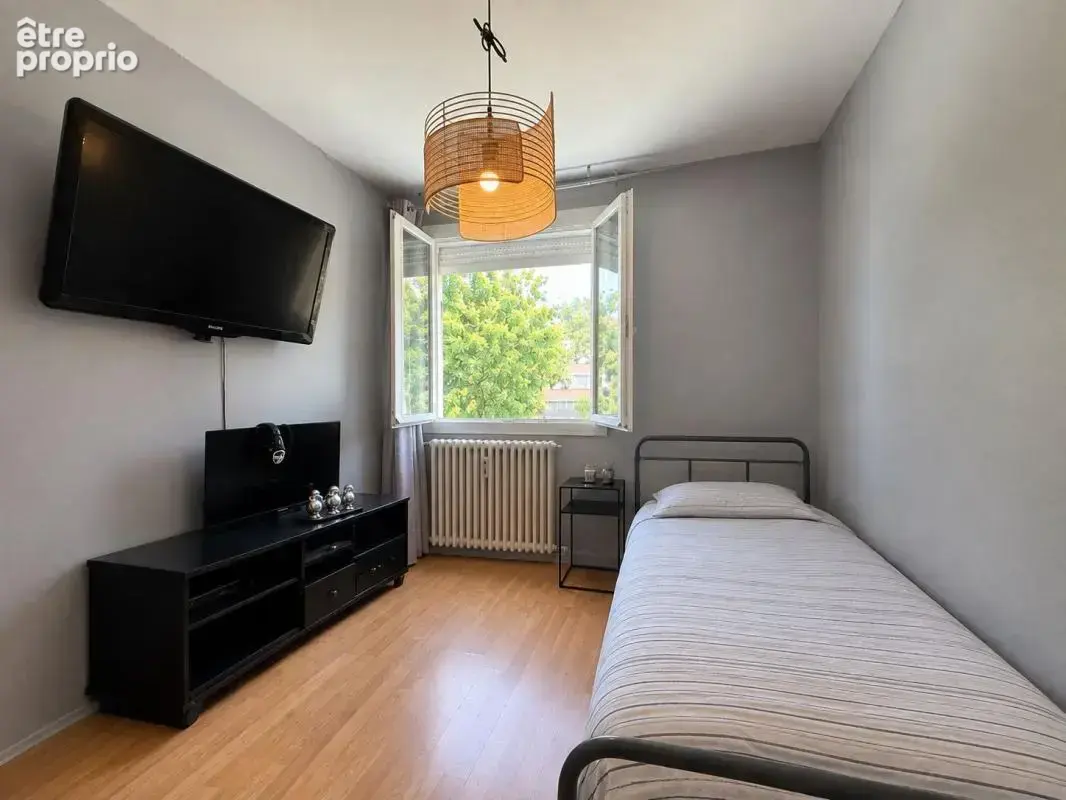 Appartement T4, 3 chambres, en rez-de-chaussée, avec cave en sous-sol - photo 6