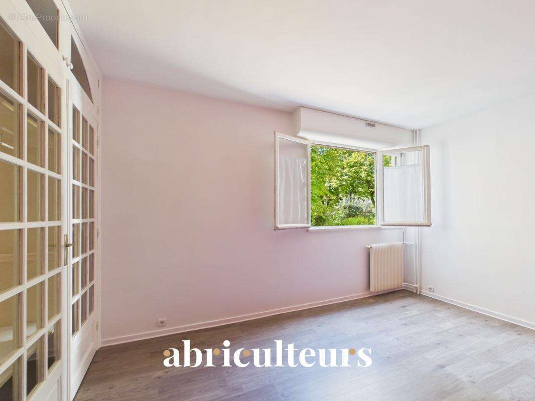 Appartement traversant avec loggia, parking et cave en vente au Plessis-Bouchard 95130 - photo 13