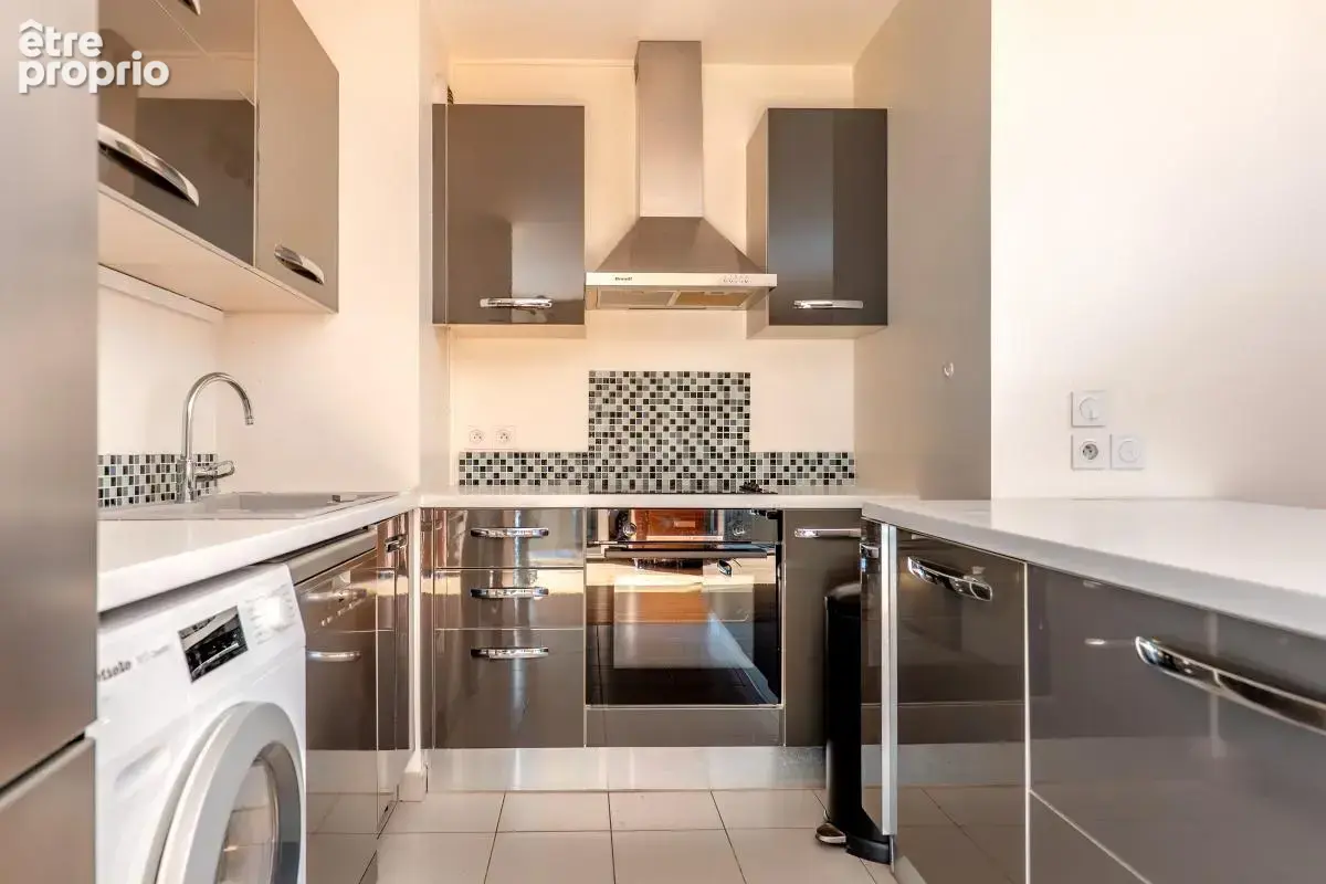 T4 de 78 m² avec jardin de 36 m² – Centre-ville – 2 chambres – 46 m² de pièce de vie – Parking - photo 2