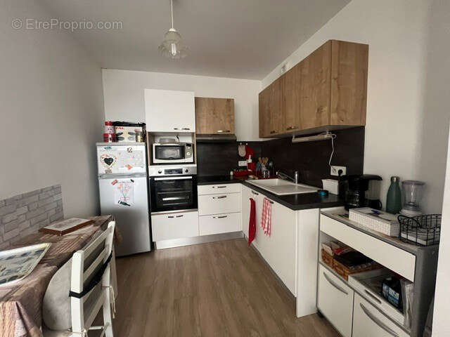 Appartement tyoe 2 vendu loué avec un balcon et parking - photo 3