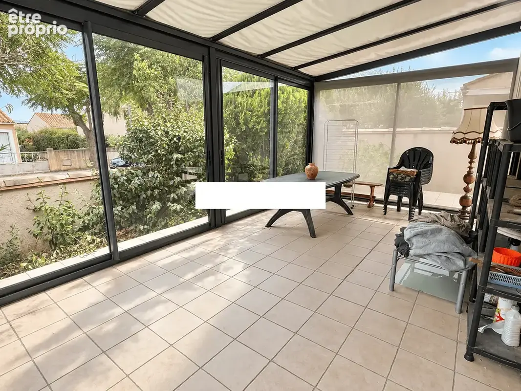 Maison 4 faces de plain-pied avec jardin, véranda et panneaux solaires - photo 6