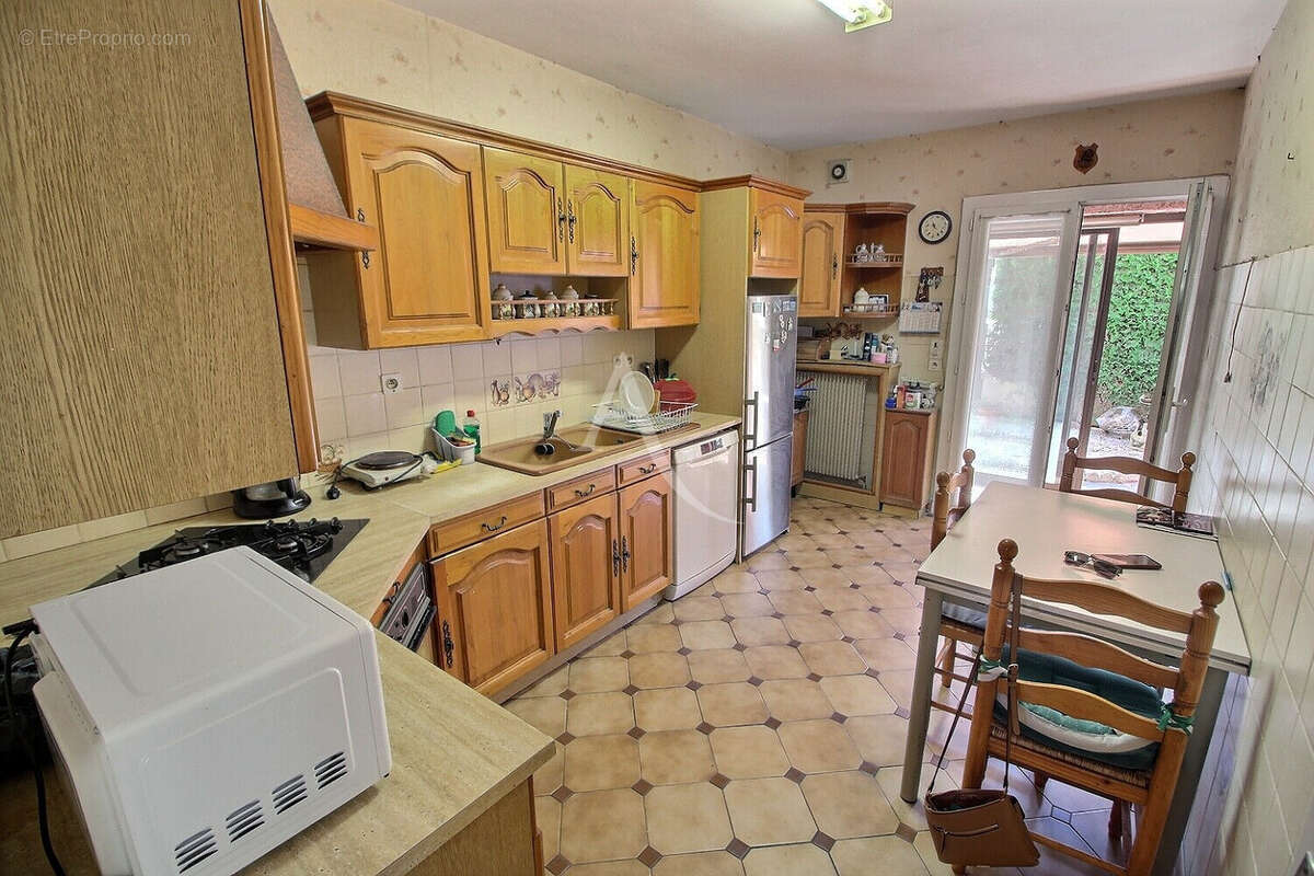 Villa de type f4 de 110 m² sur terrain  piscinable 3 faces de 312 m²  + garage - photo 6