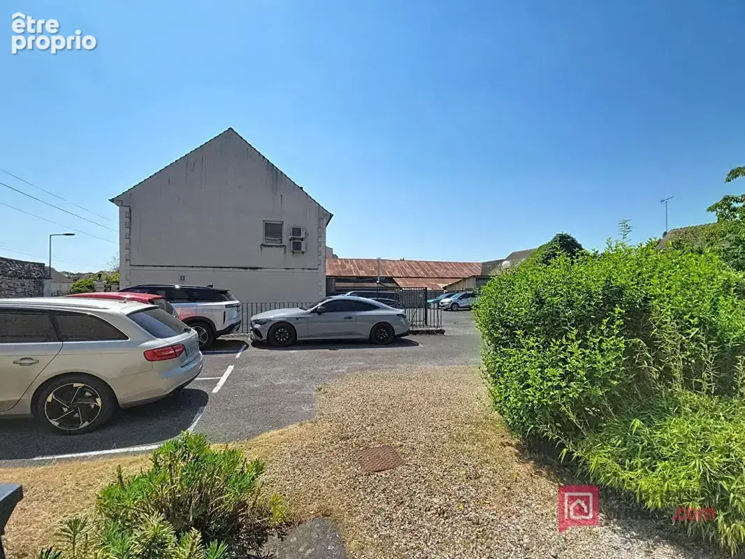Appartement en rez-de-chaussée avec cour et 2 stationnements - photo 2