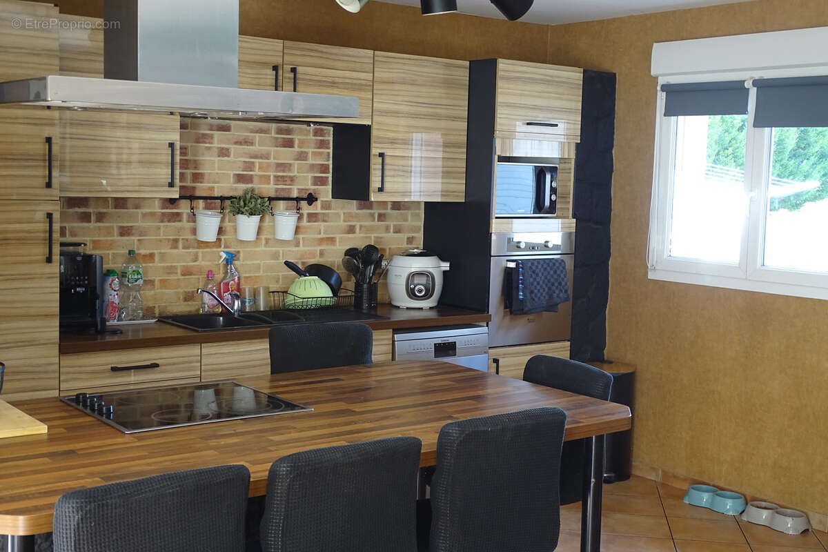 Maison de plain-pied 4 chambres avec garage - photo 4