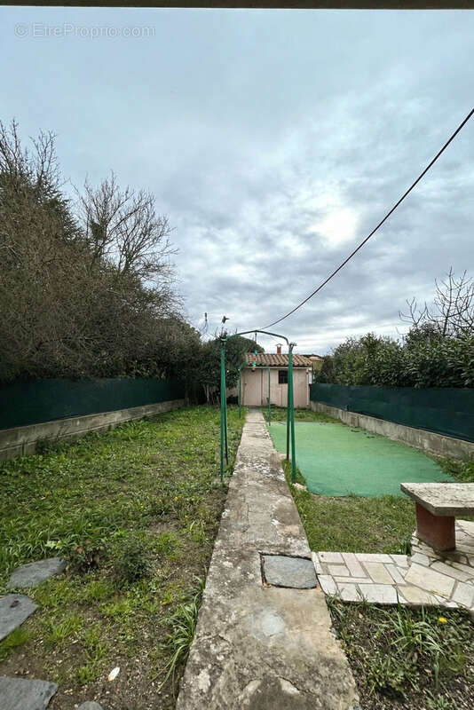 Maison T5 de 125 m2 avec jardin et atelier - photo 4
