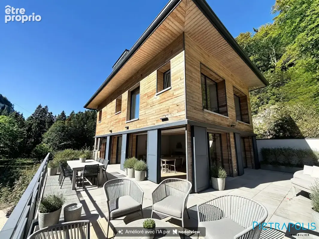 Maison 7 pièces 230 m² à vendre à Mijoux (01170) - photo 2