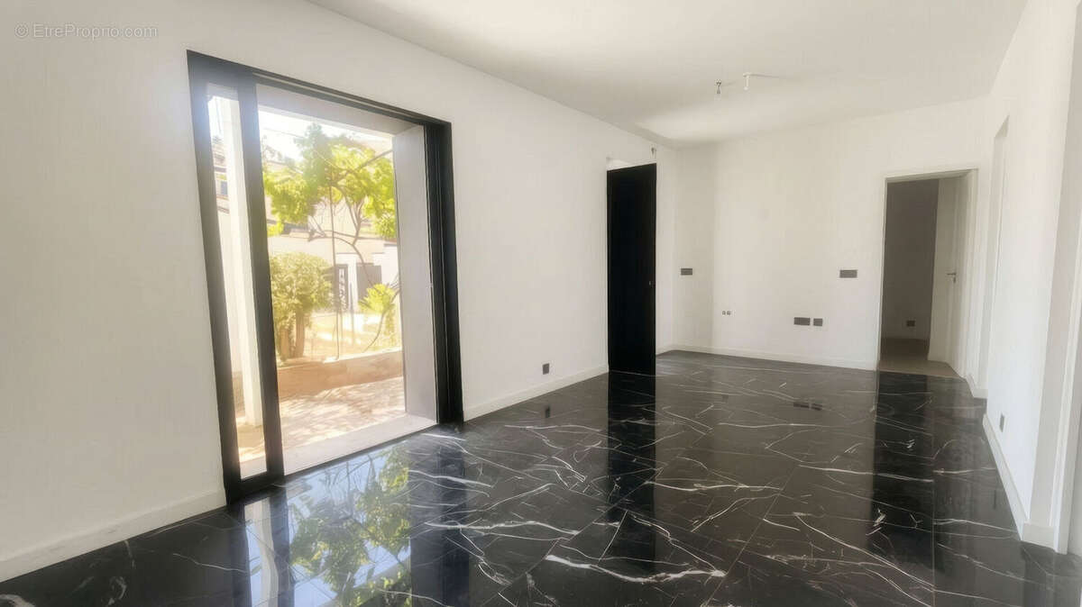 Rez de jardin 47m² - photo 2