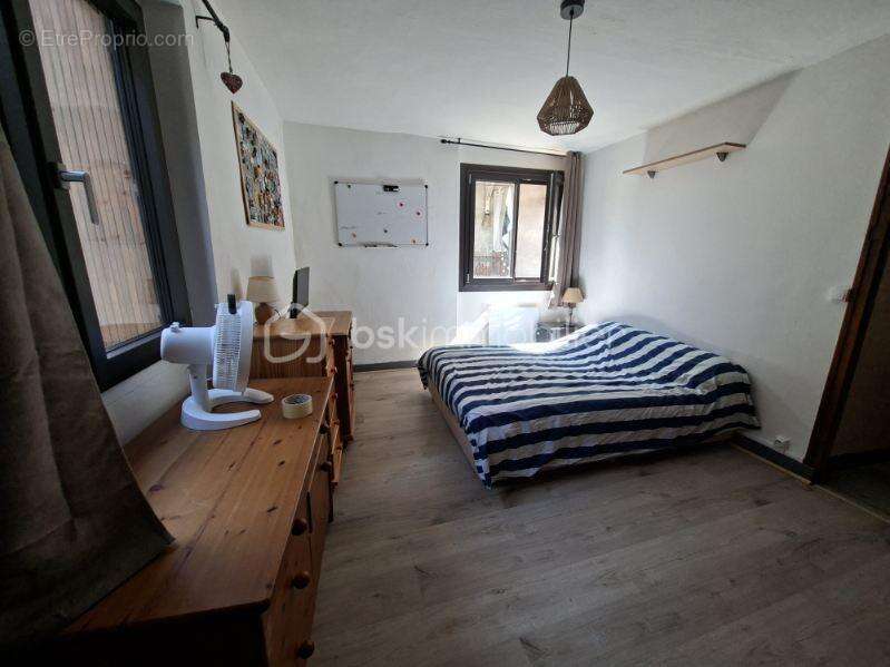 Appartement T4 de 86 m² avec jardin et cave - photo 6