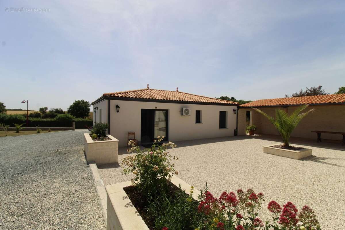 Maison 122 m² à Migre  - photo 7