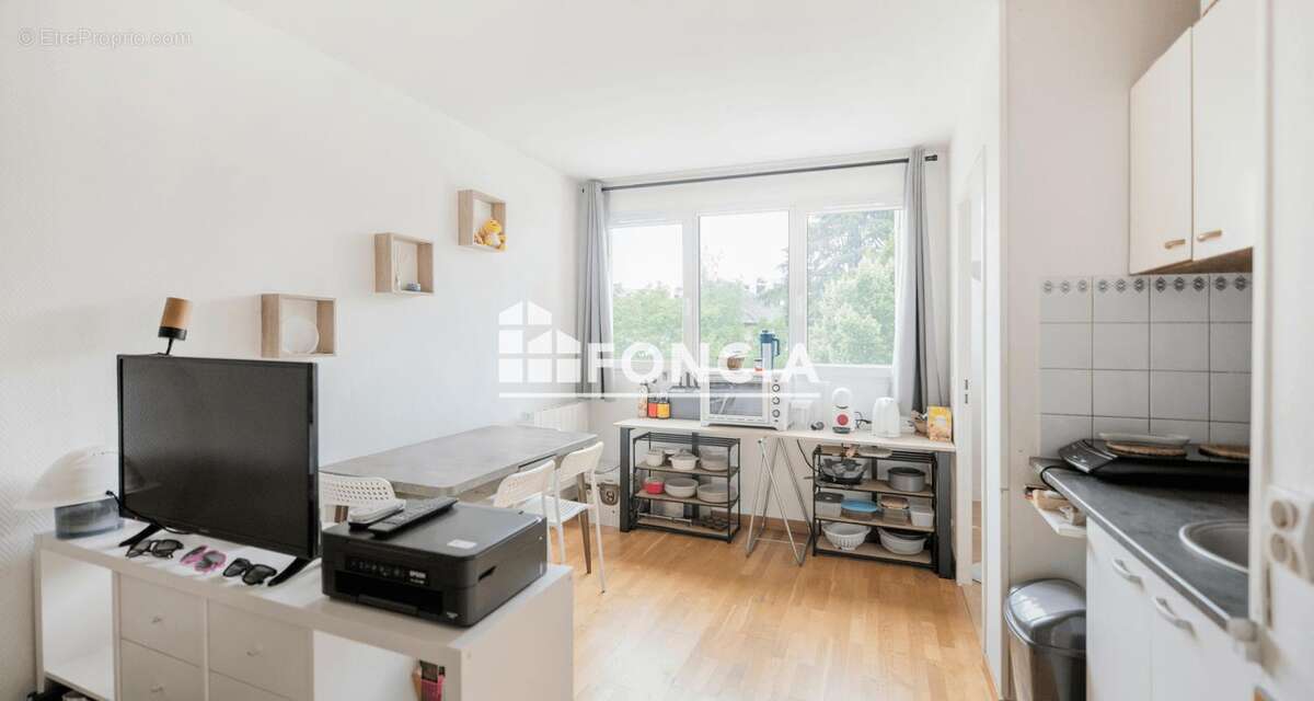 Investissement idéal : T2 de 31 m² avec parking en résidence sécurisée - photo 2