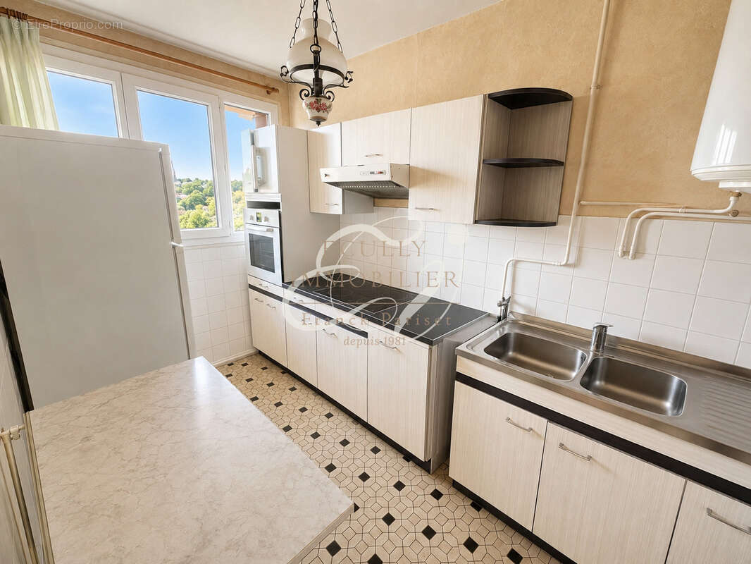 Vente 69130 ecully appartement t3, 67 m2 balcon, cave et garage - photo 3