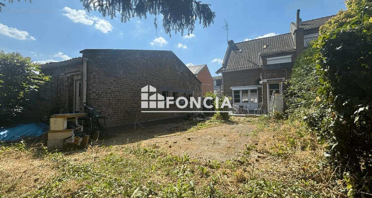 Maison semi-individuelle garage et jardin de 600m2 - photo 6