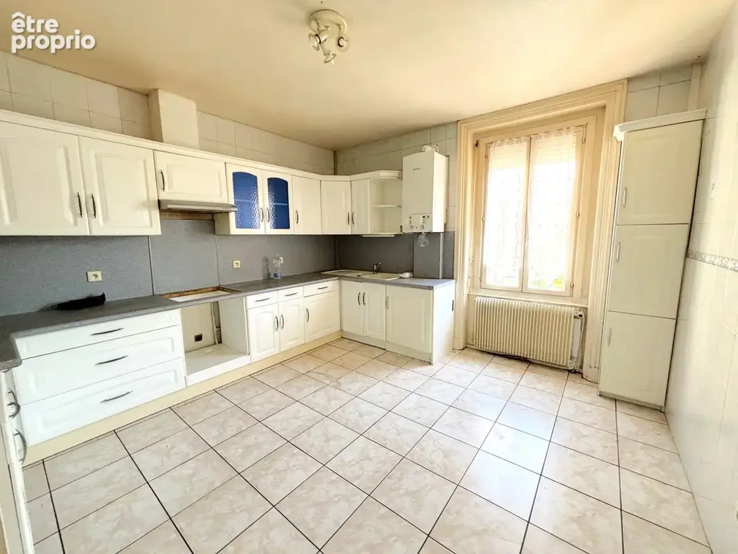 Firminy grand appartement f5 + balcon + grande cave - photo 4