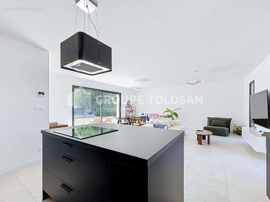 Maison 96 m² à Briatexte  - photo 7
