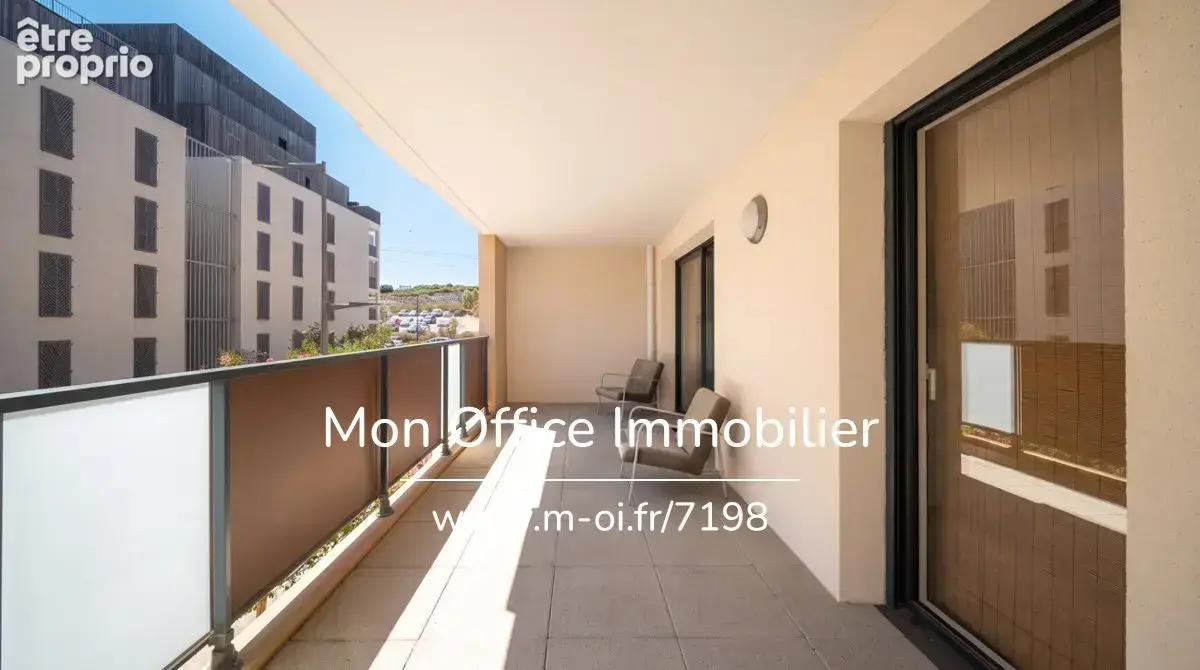 Référence : 7198-PAN - Appartement 2 pièces de 45 m² avec terrasse et garage - photo 2