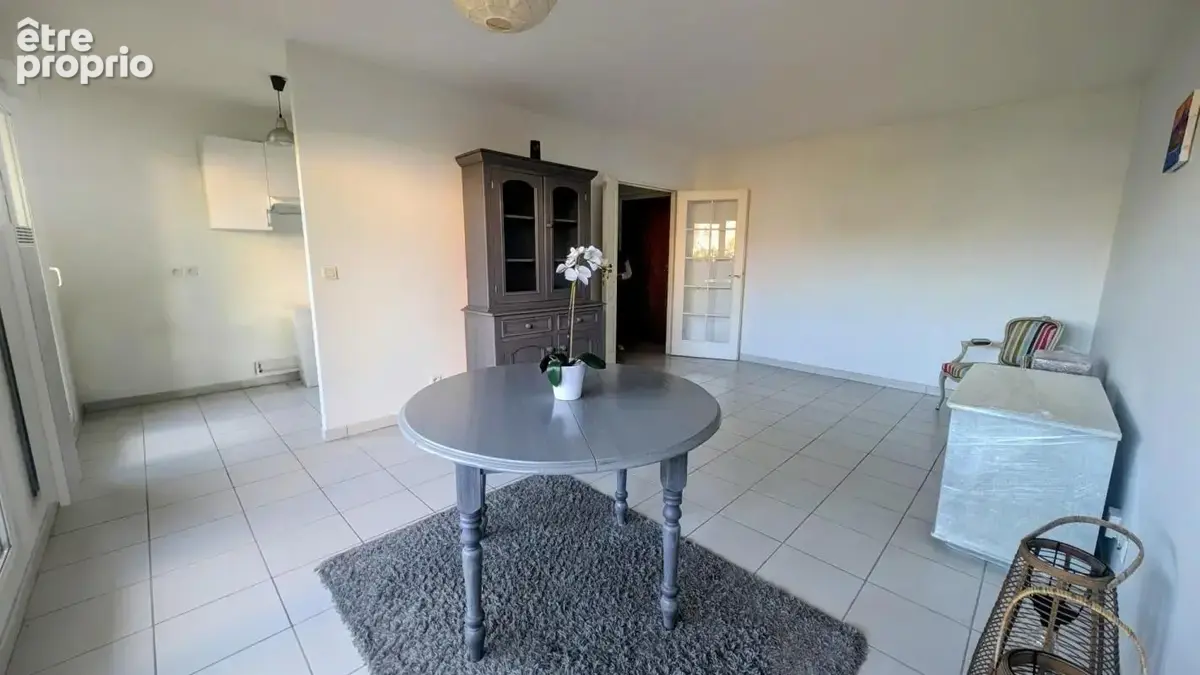 Appartement lumineux en rez-de-jardin avec place de parking - photo 2